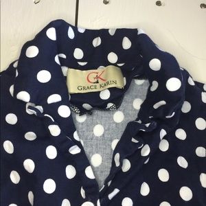 Girl’s white polka dot navy blue dress